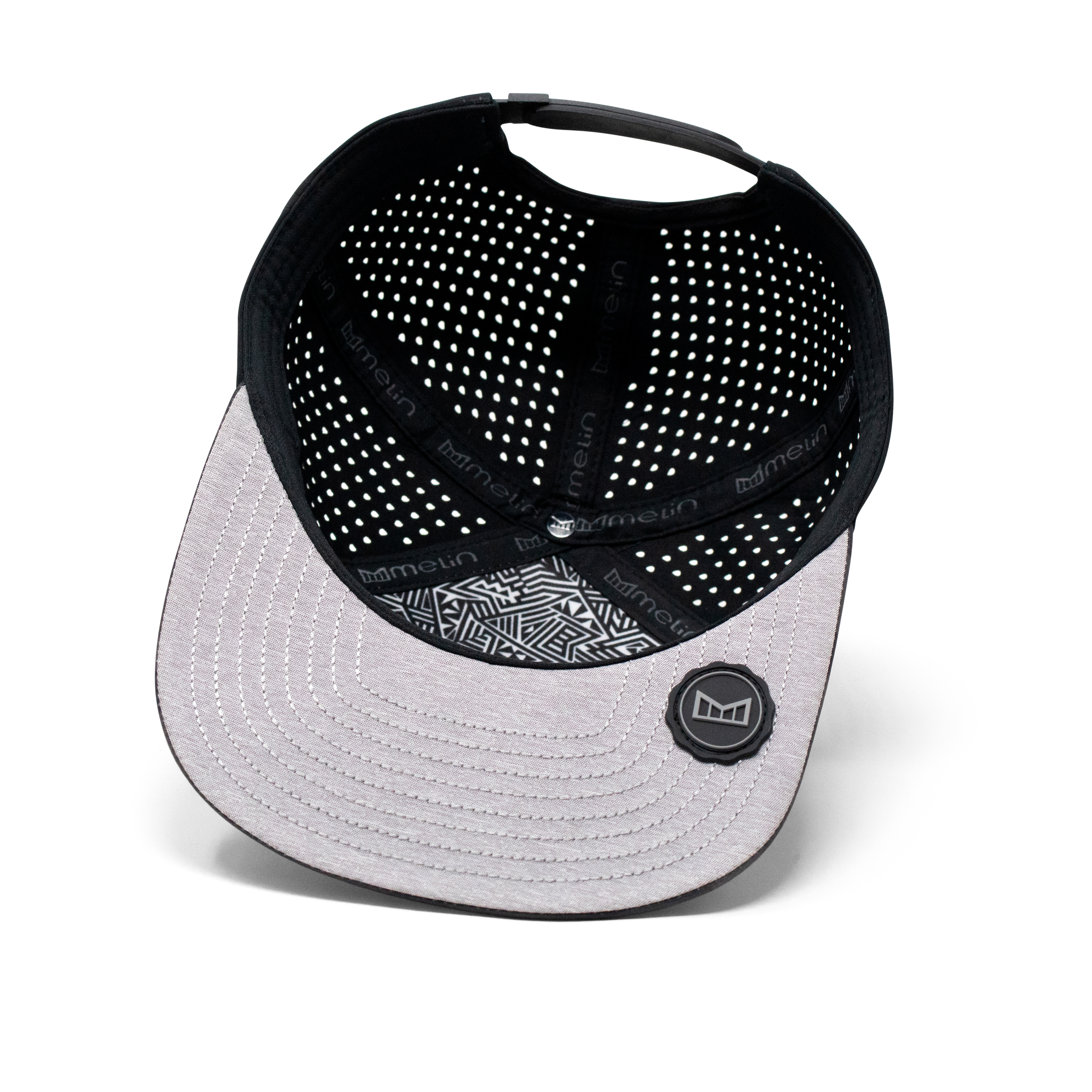 The inside view of the Melin Horizon Fit Treches Icon Hydro hat in black