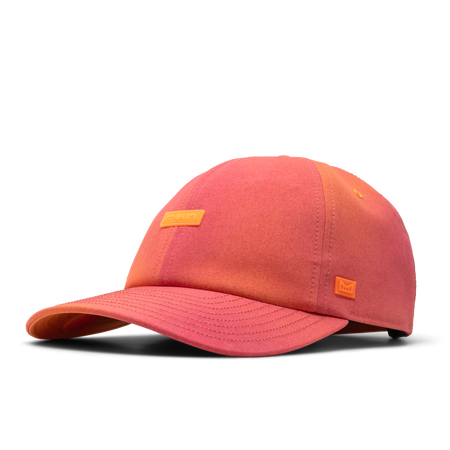 The front, angled view of the melin The Legend Hydro  Performance Dad Hat in Sunset Aura