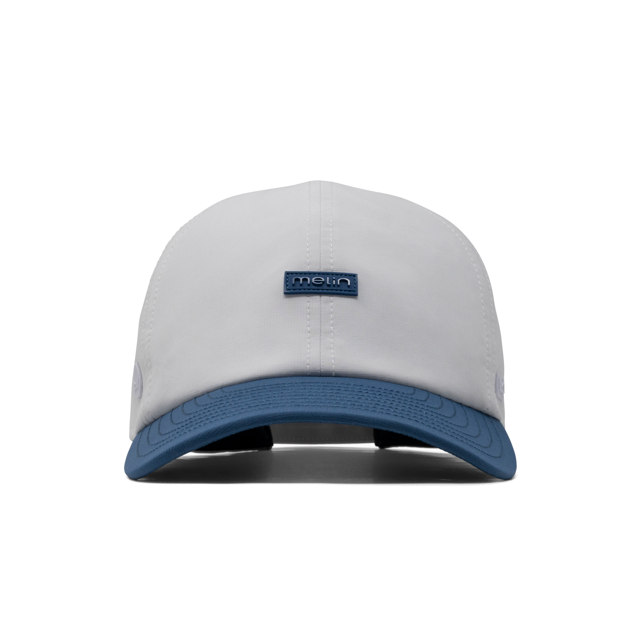 The front view of the melin The Legend Hydro  Performance Dad Hat in  Steel Blue / White