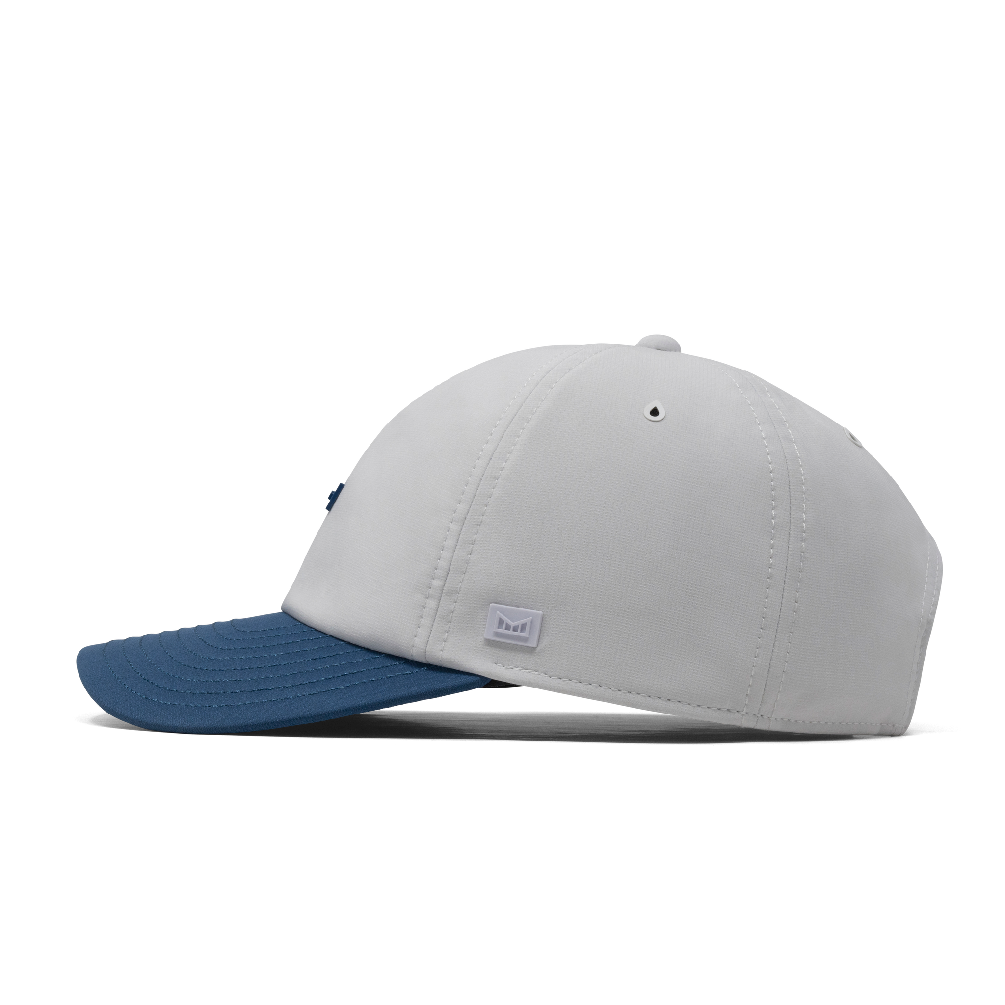 The side view of the melin The Legend Hydro  Performance Dad Hat in  Steel Blue / White